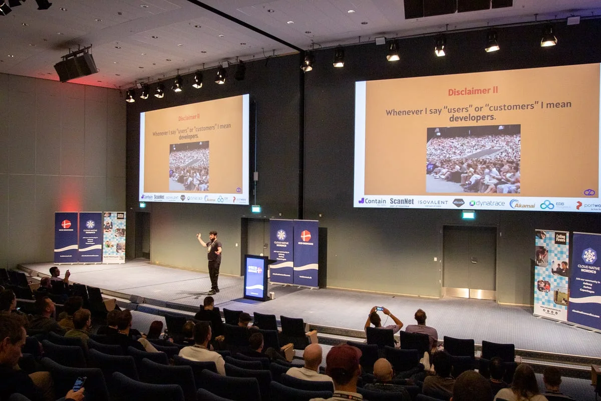 Matteo Bianchi presenting on stage at KCD Denmark
